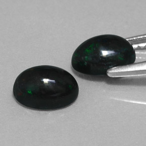 Gemas de ópalo negro multicolor natural de  ct, corte óvalo, opaco