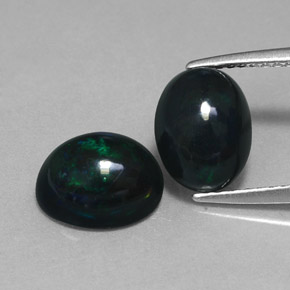 Gemas de ópalo negro multicolor natural de  ct, corte óvalo, opaco