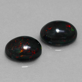 Gemas de ópalo negro multicolor natural de  ct, corte óvalo, opaco