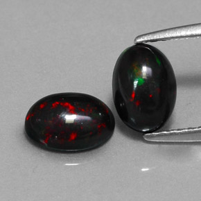 Gemas de ópalo negro multicolor natural de  ct, corte óvalo, opaco