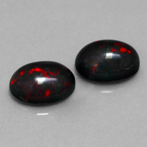 Gemas de ópalo negro multicolor natural de  ct, corte óvalo, opaco