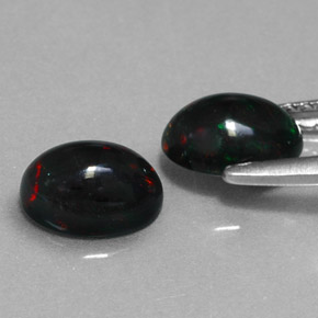 Gemas de ópalo negro multicolor natural de  ct, corte óvalo, opaco
