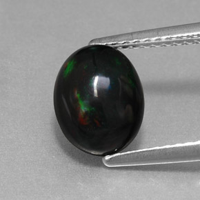 Ópalo negro multicolor natural de 1,27 ct, corte óvalo, opaco