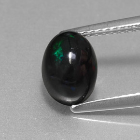 Ópalo negro multicolor natural de 1,38 ct, corte óvalo, opaco