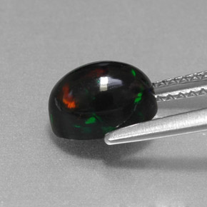 Ópalo negro multicolor natural de 1,38 ct, corte óvalo, opaco