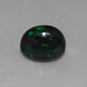 Ópalo negro multicolor natural de 1,58 ct, corte óvalo, opaco