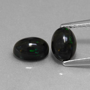 Gemas de ópalo negro multicolor natural de  ct, corte óvalo, opaco