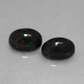 Gemas de ópalo negro multicolor natural de  ct, corte óvalo, opaco