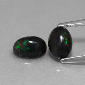 Gemas de ópalo negro multicolor natural de  ct, corte óvalo, opaco