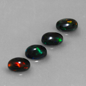Gemas de ópalo negro multicolor natural de  ct, corte óvalo, opaco