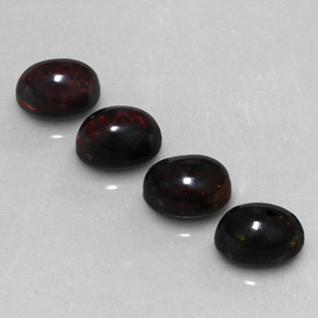 Gemas de ópalo negro multicolor natural de  ct, corte óvalo, opaco