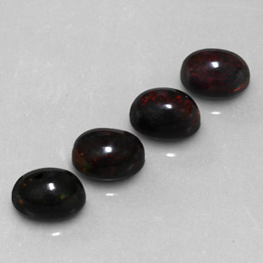 Gemas de ópalo negro multicolor natural de  ct, corte óvalo, opaco