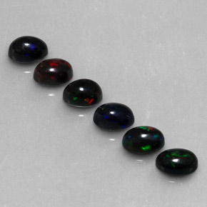 Gemas de ópalo negro multicolor natural de  ct, corte óvalo, opaco