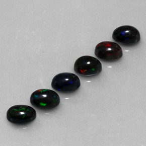 Gemas de ópalo negro multicolor natural de  ct, corte óvalo, opaco