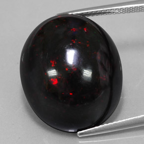 Ópalo negro multicolor natural de 20,04 ct, corte óvalo, opaco