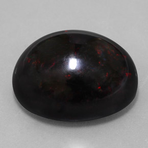 Ópalo negro multicolor natural de 20,04 ct, corte óvalo, opaco