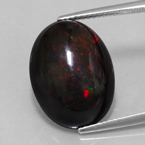Ópalo negro multicolor natural de 7,87 ct, corte óvalo, opaco