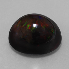 Ópalo negro multicolor natural de 13,63 ct, corte óvalo, opaco