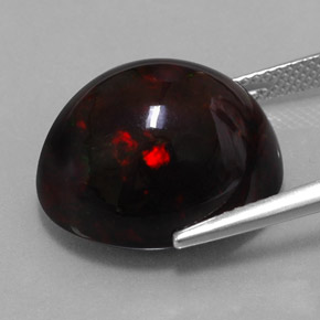 Ópalo negro multicolor natural de 13,63 ct, corte óvalo, opaco