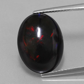 Ópalo negro multicolor natural de 5,63 ct, corte óvalo, opaco