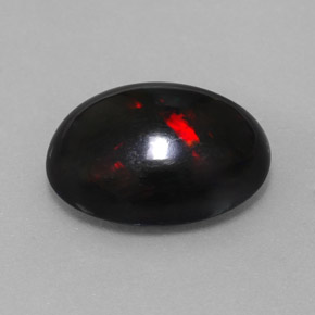 Ópalo negro multicolor natural de 5,63 ct, corte óvalo, opaco