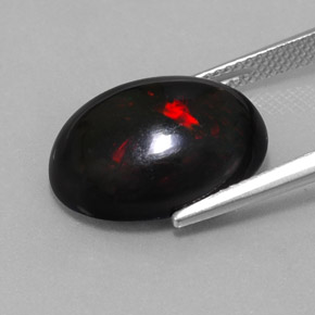 Ópalo negro multicolor natural de 5,63 ct, corte óvalo, opaco