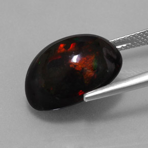 Ópalo negro multicolor natural de 8,11 ct, corte óvalo, opaco