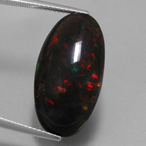 Ópalo negro multicolor natural de 17,92 ct, corte óvalo, opaco