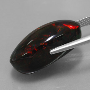 Ópalo negro multicolor natural de 17,92 ct, corte óvalo, opaco