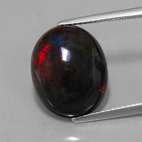 Ópalo negro multicolor natural de 5,81 ct, corte óvalo, opaco