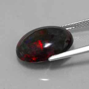 Ópalo negro multicolor natural de 5,81 ct, corte óvalo, opaco