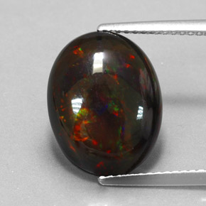 Ópalo negro multicolor natural de 3,17 ct, corte óvalo, opaco