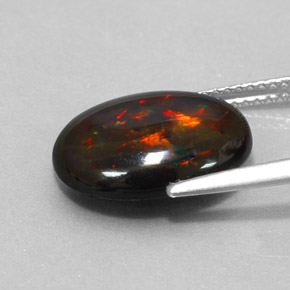 Ópalo negro multicolor natural de 3,17 ct, corte óvalo, opaco