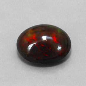 Ópalo negro multicolor natural de 4,31 ct, corte óvalo, opaco