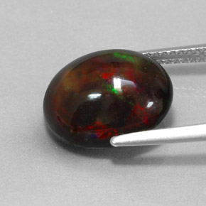 Ópalo negro multicolor natural de 4,31 ct, corte óvalo, opaco