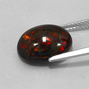 Ópalo negro multicolor natural de 3,73 ct, corte óvalo, opaco