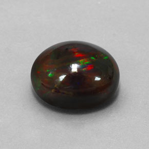 Ópalo negro multicolor natural de 3,84 ct, corte óvalo, opaco