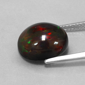 Ópalo negro multicolor natural de 3,84 ct, corte óvalo, opaco