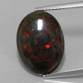 Ópalo negro multicolor natural de 3,60 ct, corte óvalo, opaco