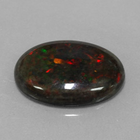 Ópalo negro multicolor natural de 3,60 ct, corte óvalo, opaco
