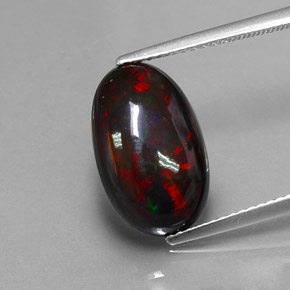 Ópalo negro multicolor natural de 3,80 ct, corte óvalo, opaco