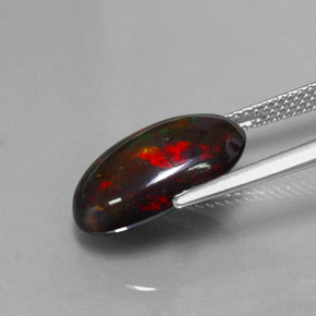 Ópalo negro multicolor natural de 3,80 ct, corte óvalo, opaco