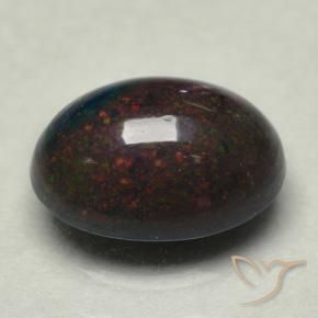 Ópalo negro multicolor natural de 0,74 ct, corte óvalo, opaco