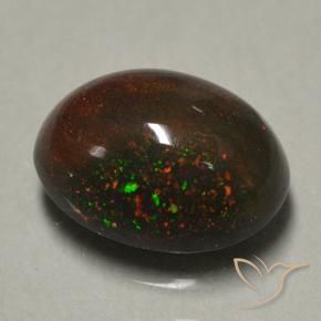Ópalo negro multicolor natural de 0,89 ct, corte óvalo, opaco