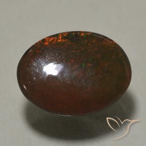 Ópalo negro multicolor natural de 0,89 ct, corte óvalo, opaco