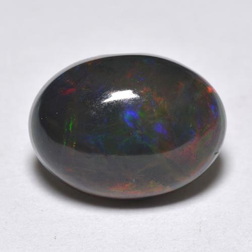 Ópalo negro multicolor natural de 1,33 ct, corte óvalo, translúcido
