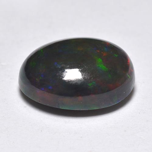 Ópalo negro multicolor natural de 1,33 ct, corte óvalo, translúcido