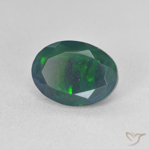Ópalo negro Multicolor natural de 1.31 ct, Ovalada, Translúcido