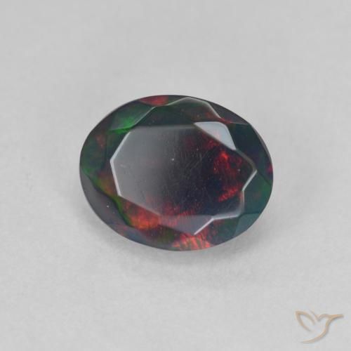 Ópalo negro Multicolor natural de 1.09 ct, Ovalada, Translúcido