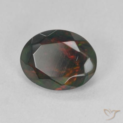 Ópalo negro Multicolor natural de 1.19 ct, Ovalada, Translúcido